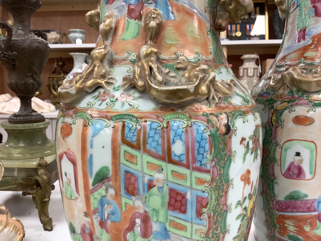 A pair of late 19th century Chinese famille rose vases, height 36cm